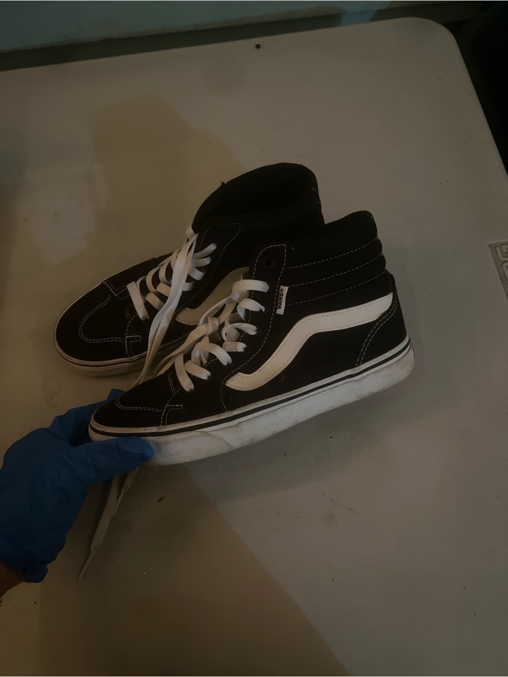 Vans Black and White High-Top Skate Sneakers